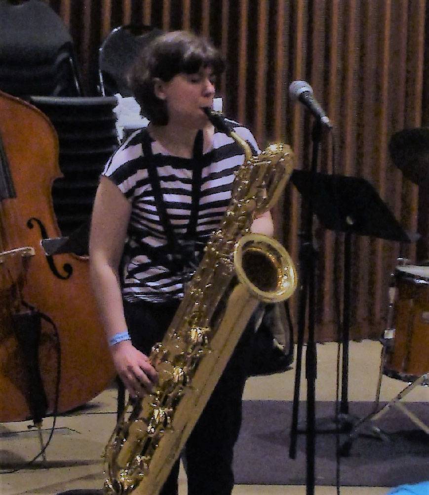 Sarah Turkiew playing saxaphone